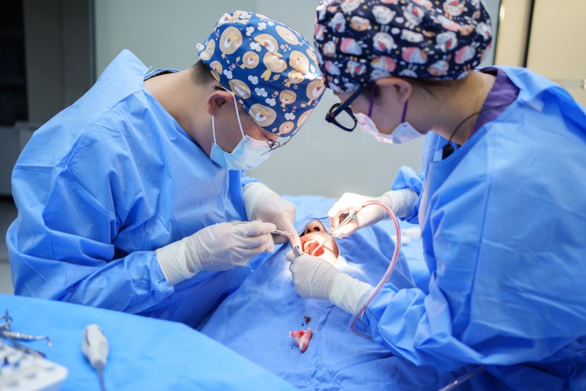 Dentists managing post-procedure bleeding